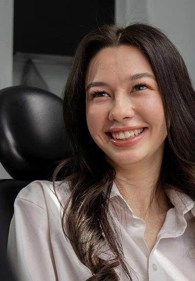 woman smiling at Dr. Sumeet Kaur Family Dentistry